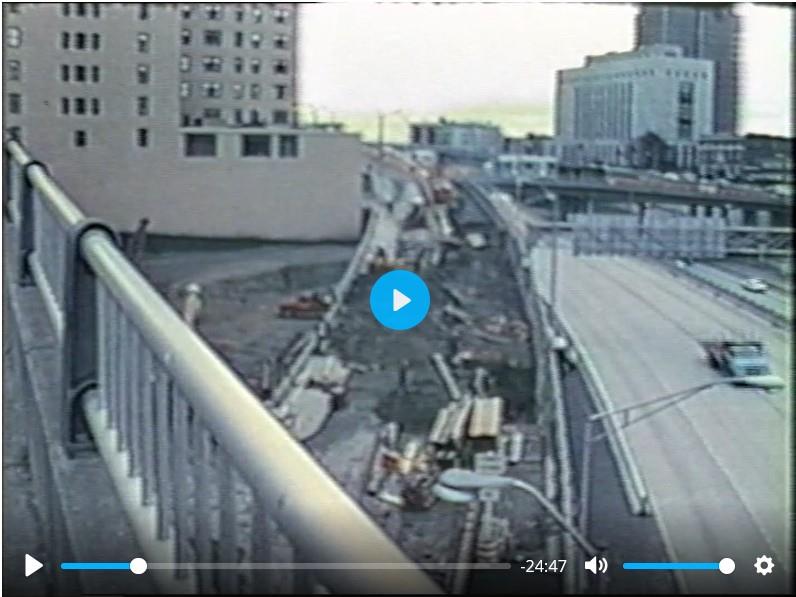 screenshot from footage of Freeway Park under construction in 1974