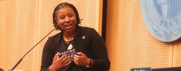 council president Hollingsworth speaking at the podium in City Hall Chambers