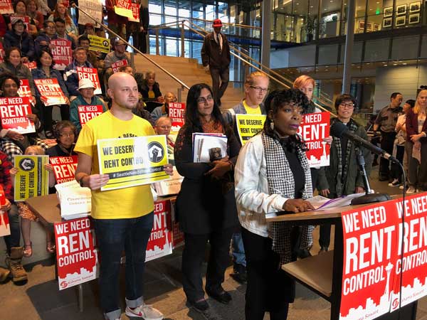 rally for rent control in Seattle City Hall