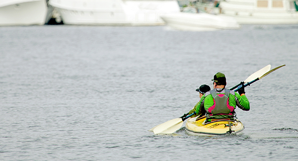 Two people paddling in a kayak