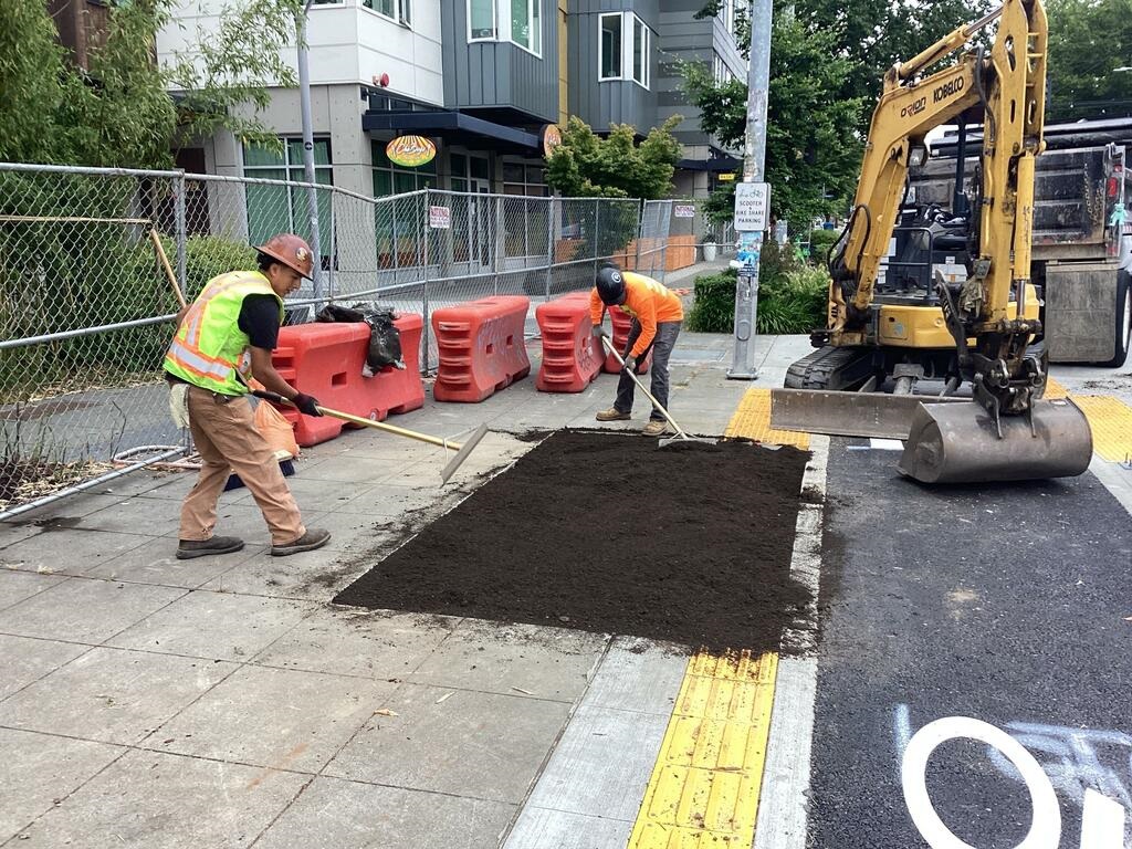 Crews creating a new tree pit near S Lander St for a tree to be planted this fall.
