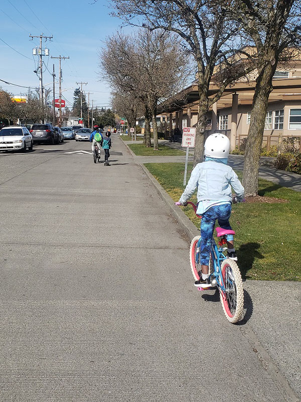 Image of a child riding a bike