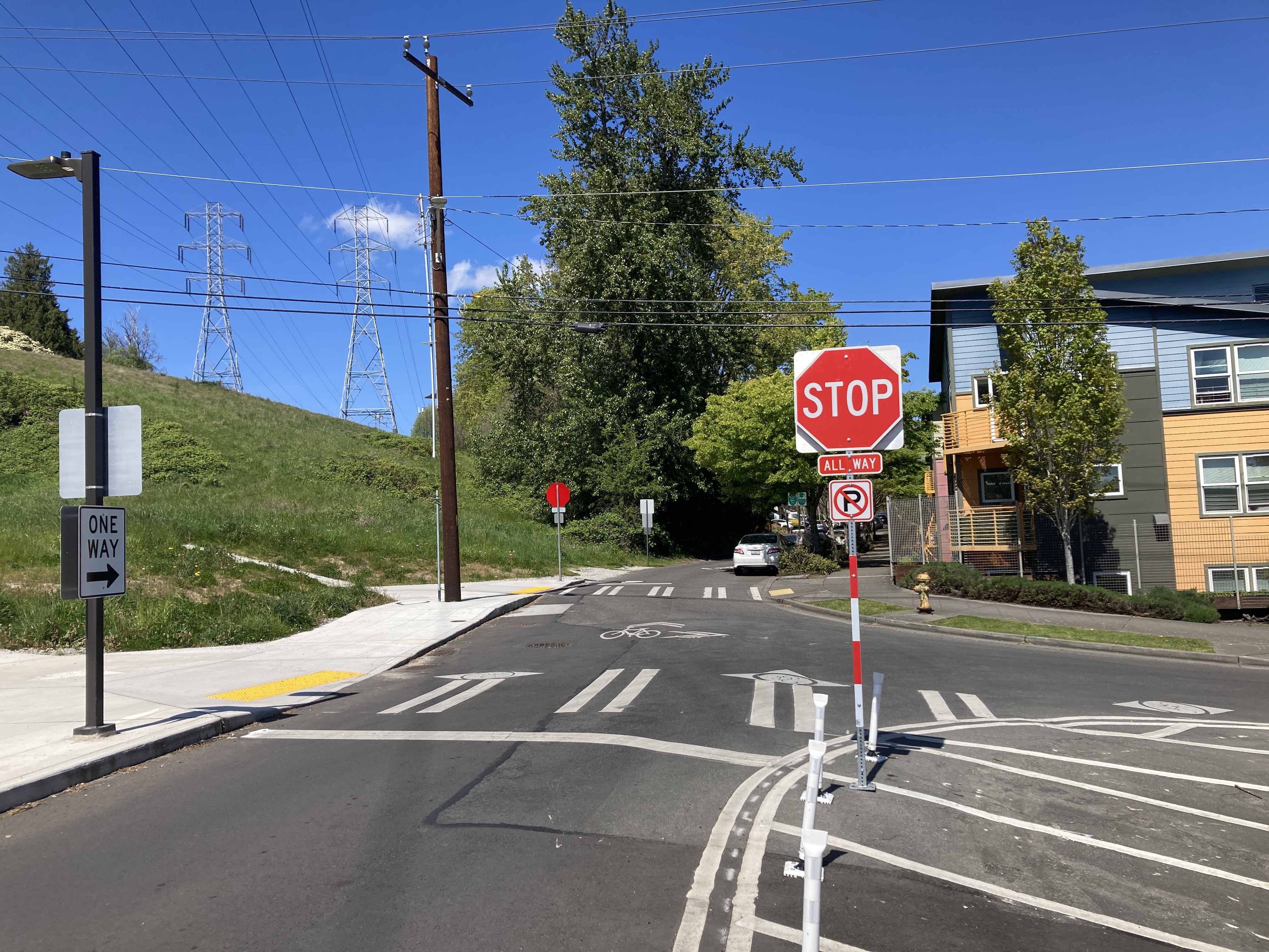New stop sign and stop bar installed on a corner