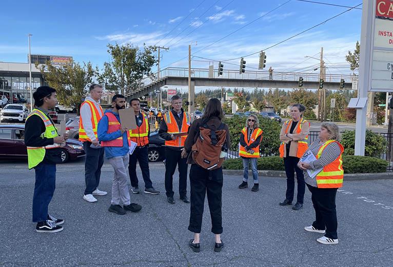 Community Advisory Group (CAG) participants, SDOT staff, and a representative from OPCD, at Aurora Ave N and N 130th St during the corridor site tour on September 30, 2026.