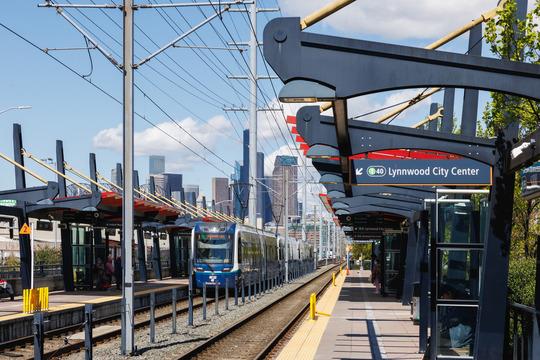 Light rail tracks and platform on a sunny day 