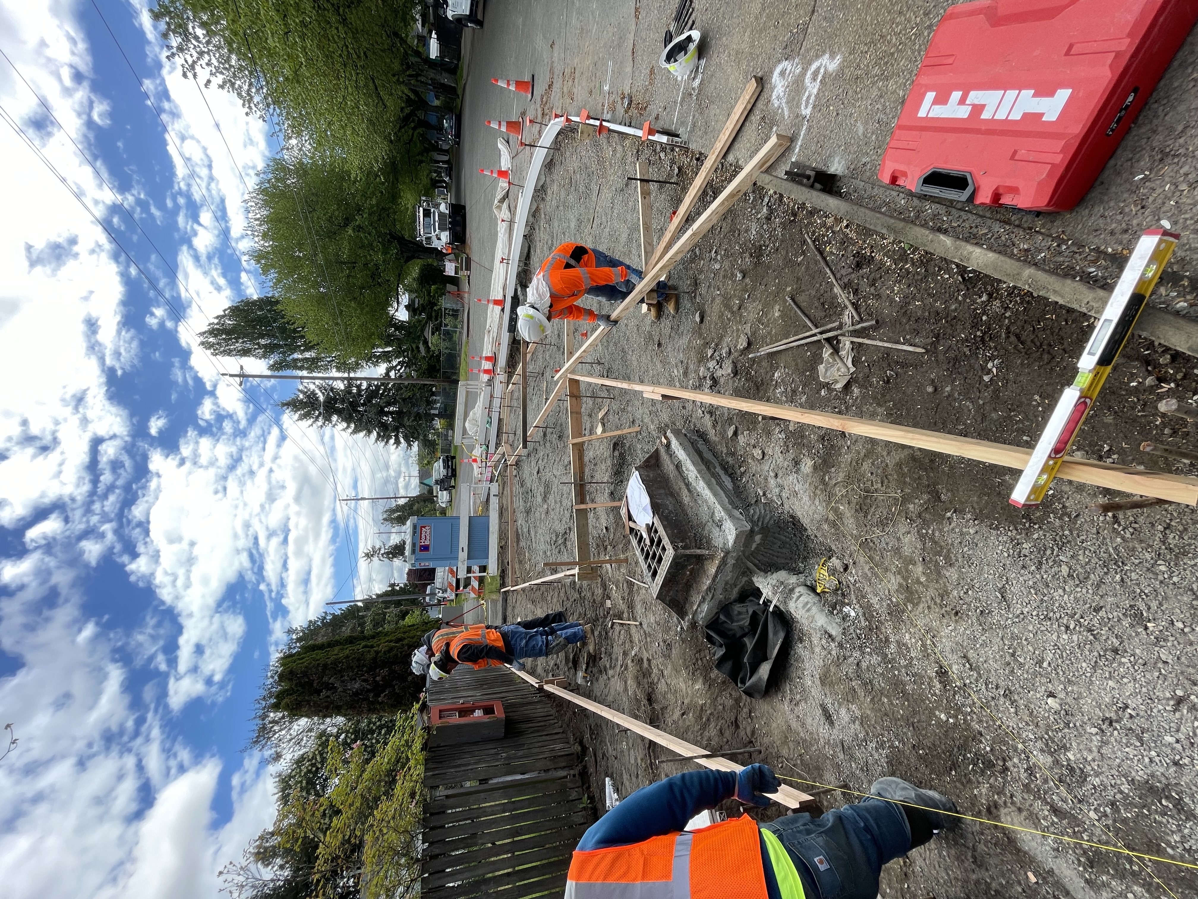 SDOT crews laying out formboard for a new concrete pour