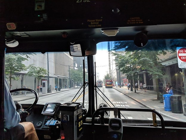 King County Metro bus drivers navigate 3rd Ave’s bus only lanes through downtown Seattle