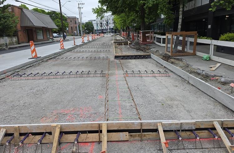 Image shows the street ready for new concrete along Eastlake Ave E