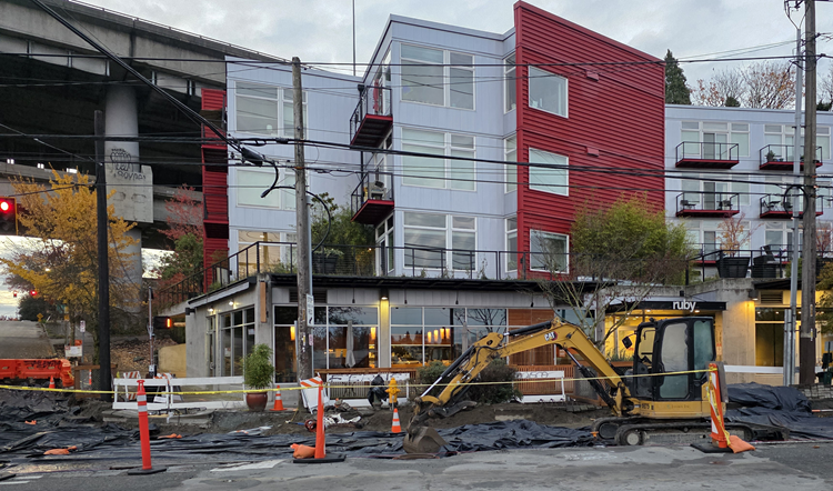 Paving at night south of E Allison St