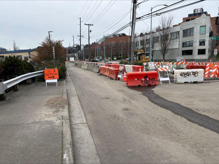 Image shows the temporary pedestrian walkway on Fairview Ave N near E Aloha St.
