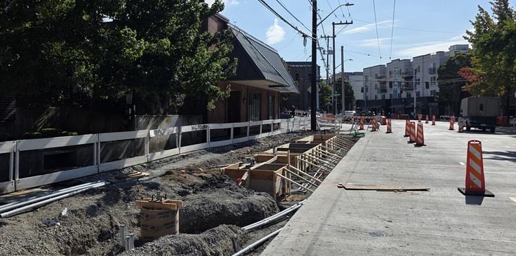 Image shows our team creating formwork for new concrete near E Hamlin St. This concrete will be the platform for a RapidRide J Line bus stop