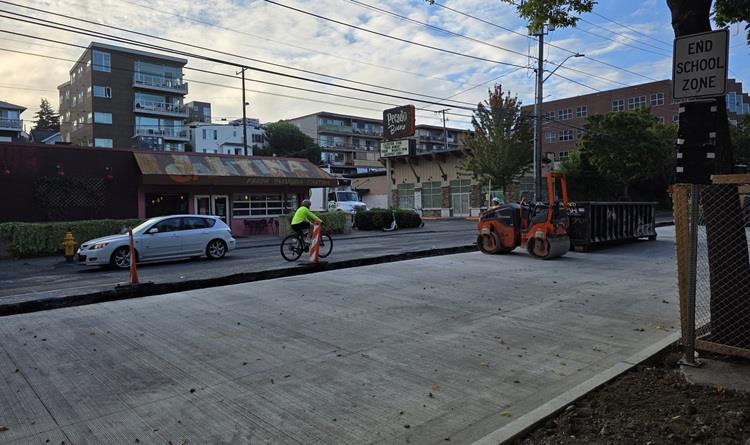 Image shows new concrete on the west side of Eastlake Ave E near E Louisa St. 