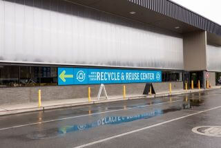 Recycling & Reuse Center sign.