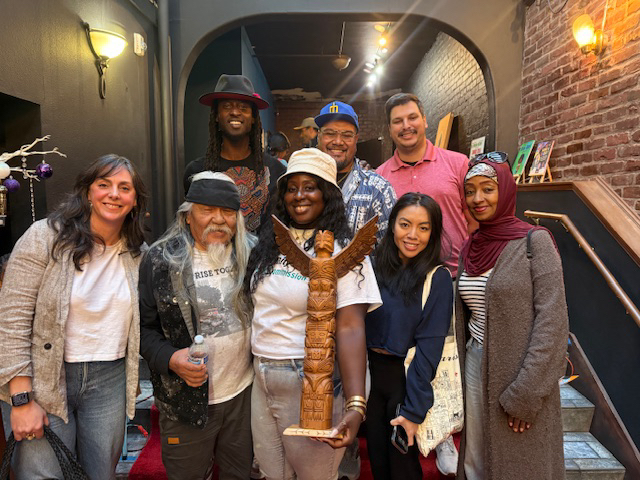 Commissioners, Ken Nsimbi and Rick Williams with CPC Staff