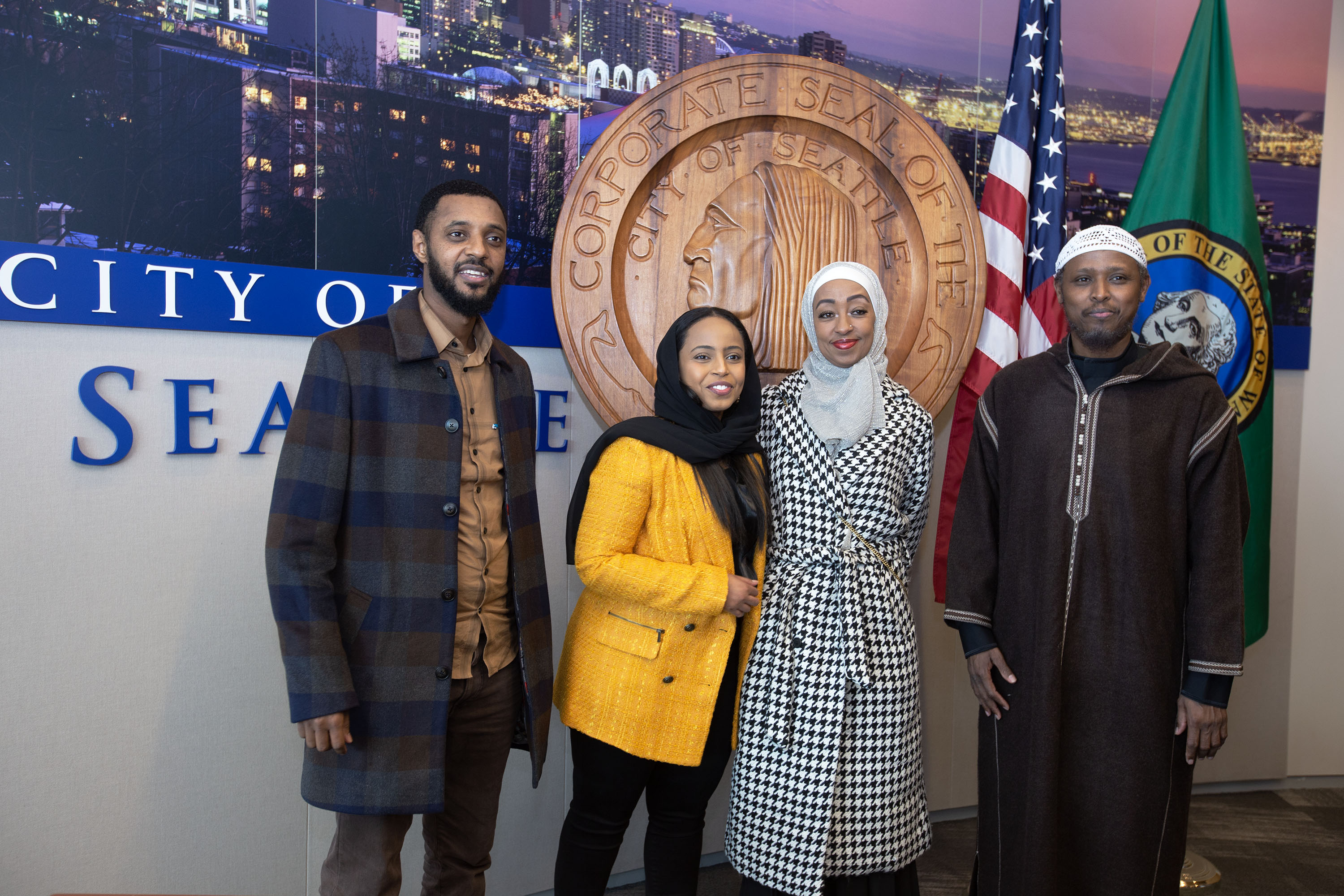 CPC's Engagement Specialist, Mergitu Argo, and Hamdi Mohamed from the Seattle Office of Immigrant Affairs, with community faith leaders.