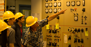 Interns at a utility panel
