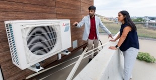 STEM intern and research engineer explore energy-efficient modular housing at the National Renewable Energy Laboratory. Photo credit: Werner Slocum / NREL. Source: https://images.nrel.gov/mx/Profiles/en/landing/