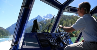 Captain driving Skagit boat tour