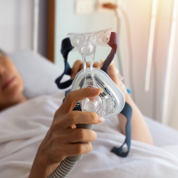 Woman with CPAP machine