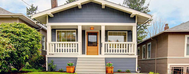 A blue house with white trim