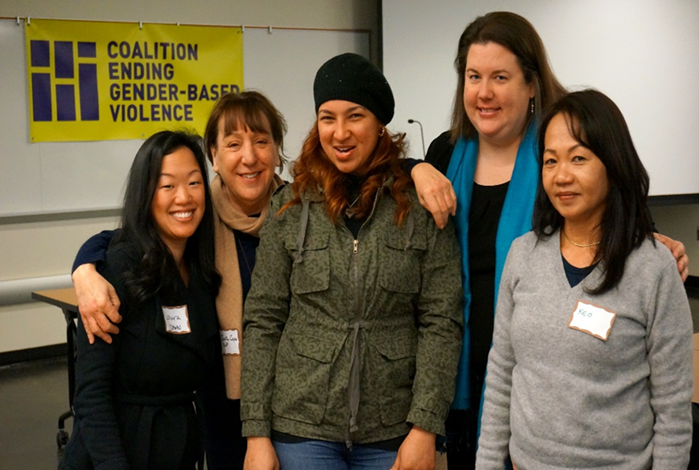 Staff posing for photo at Coalition on Ending Gender-Based Violence