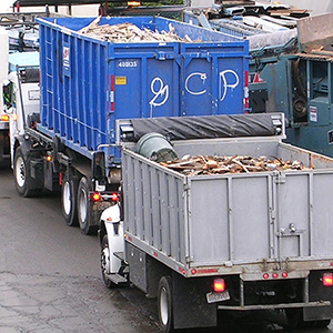Photo of trucks hauling construction debris