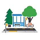 Two trees next to a bus stop and a bicycle