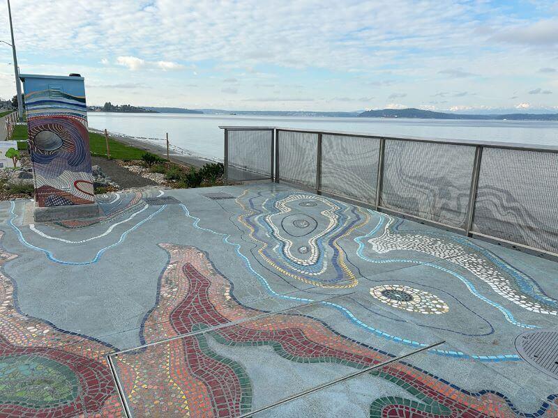 Looking west with utility box and Puget Sound in background.