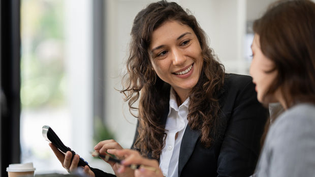 Two women working on a budget