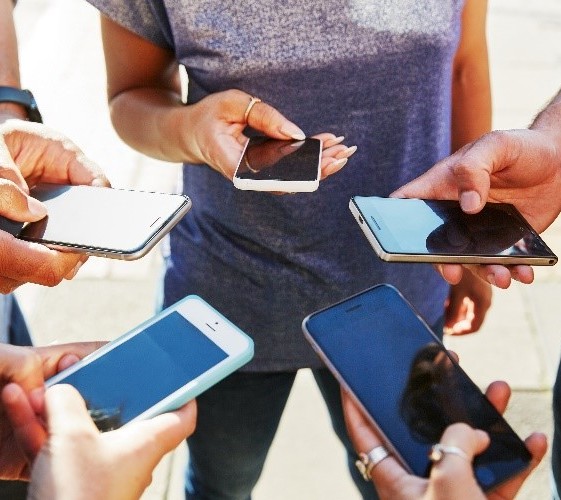 people holding cell phones