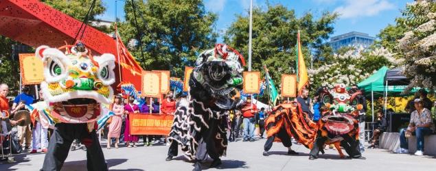 Lion dancers at neighborhood celebration