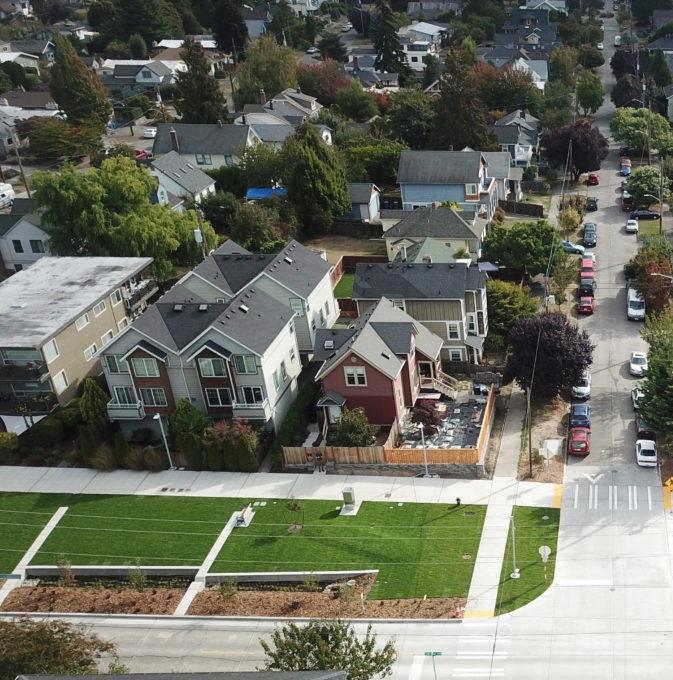 Aerial view of neighborhood with mix of housing types.