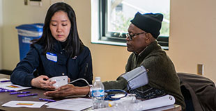 Patient getting blood pressure monitored